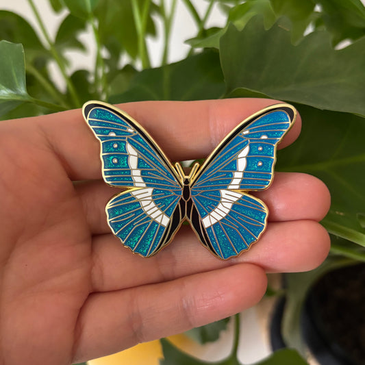 Blue Glitter Butterfly Enamel Pin – Elegant Gold Outline Lapel Pin