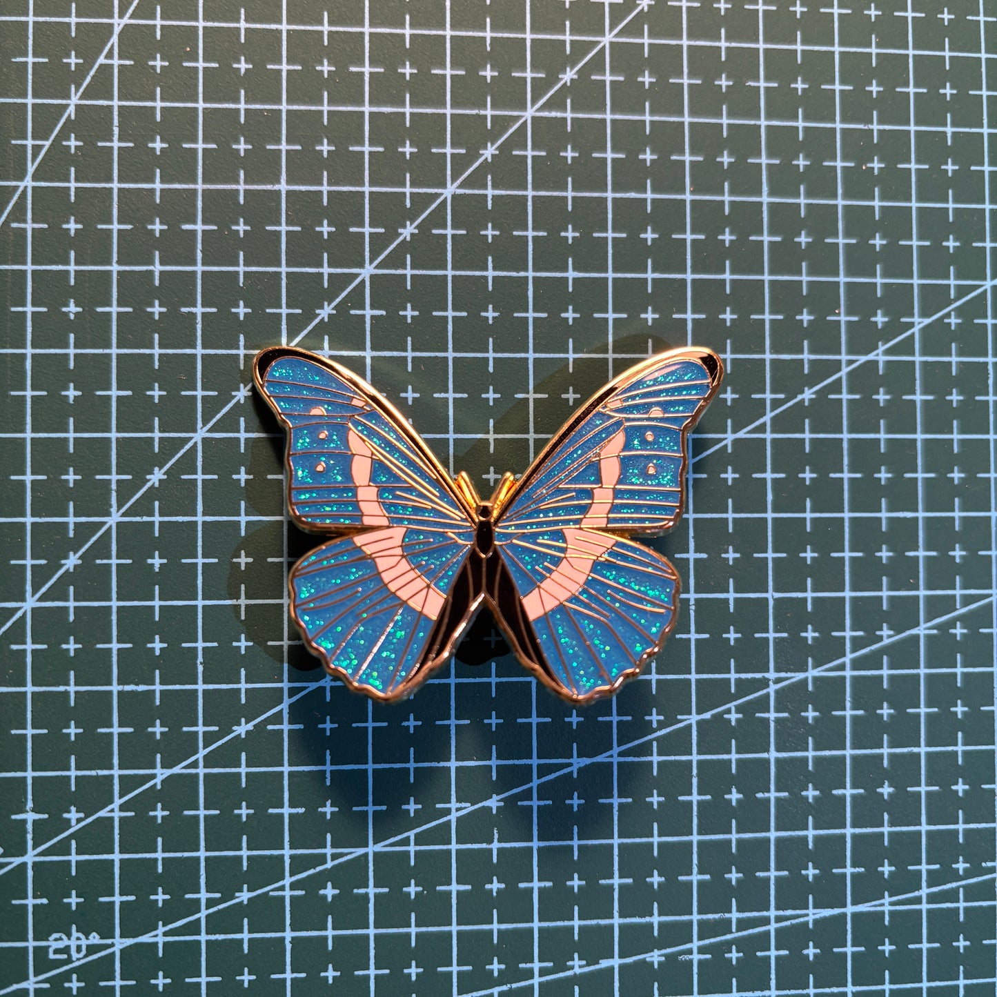 Blue Glitter Butterfly Enamel Pin – Elegant Gold Outline Lapel Pin