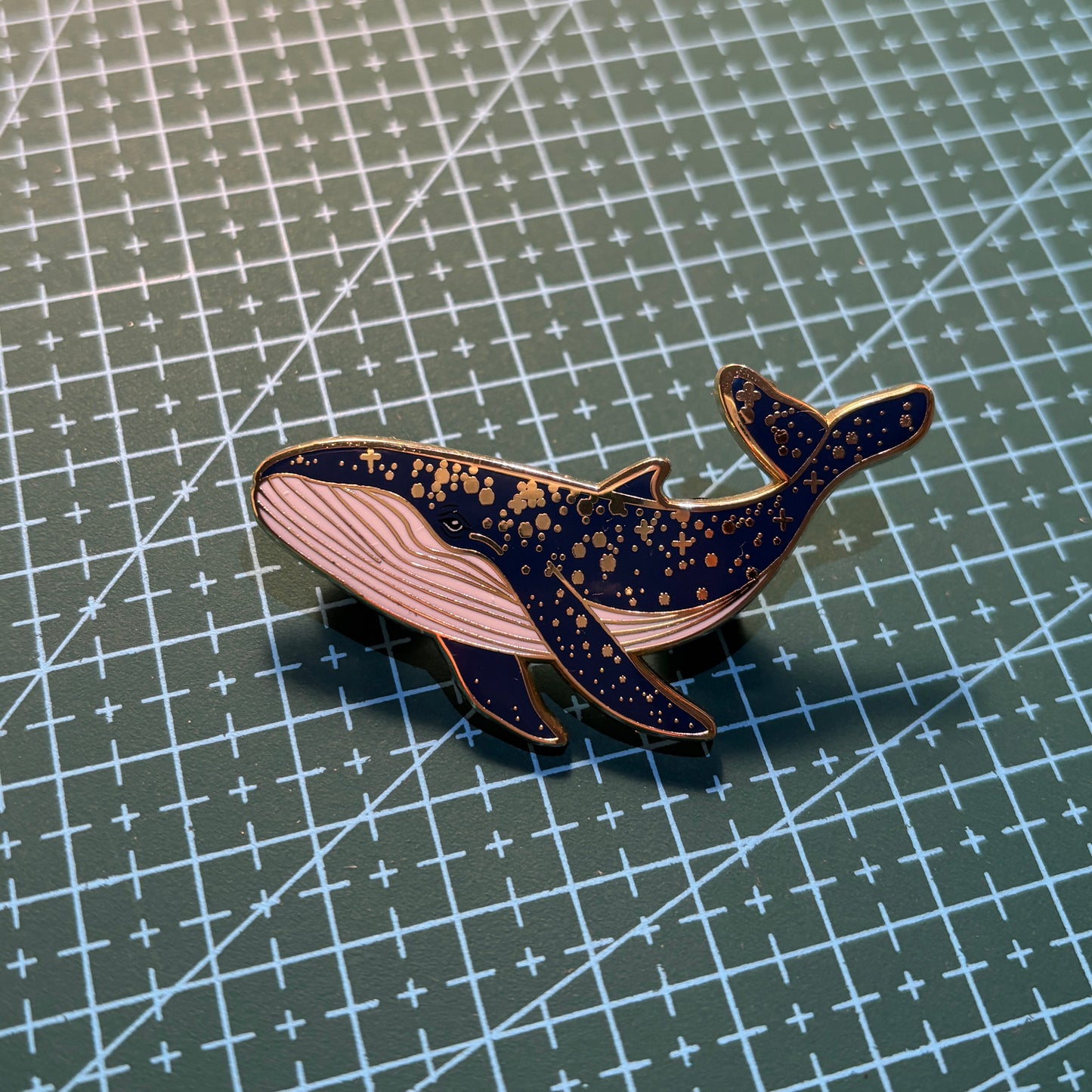 Cosmic Whale Enamel Pin – Deep Sea Blue with Gold Accents