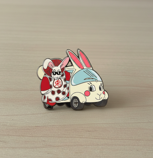 Cartoon character with rabbit ears riding a scooter on a wooden surface